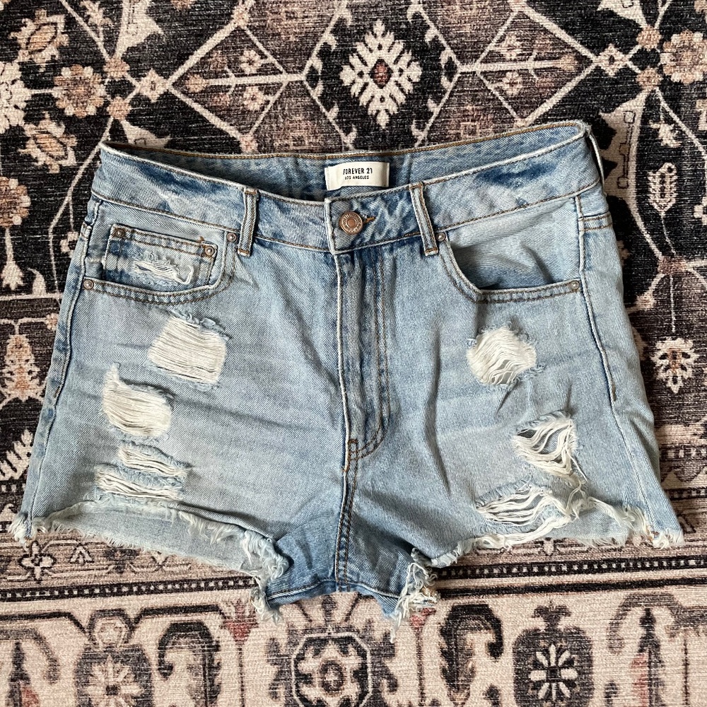Distressed denim shorts